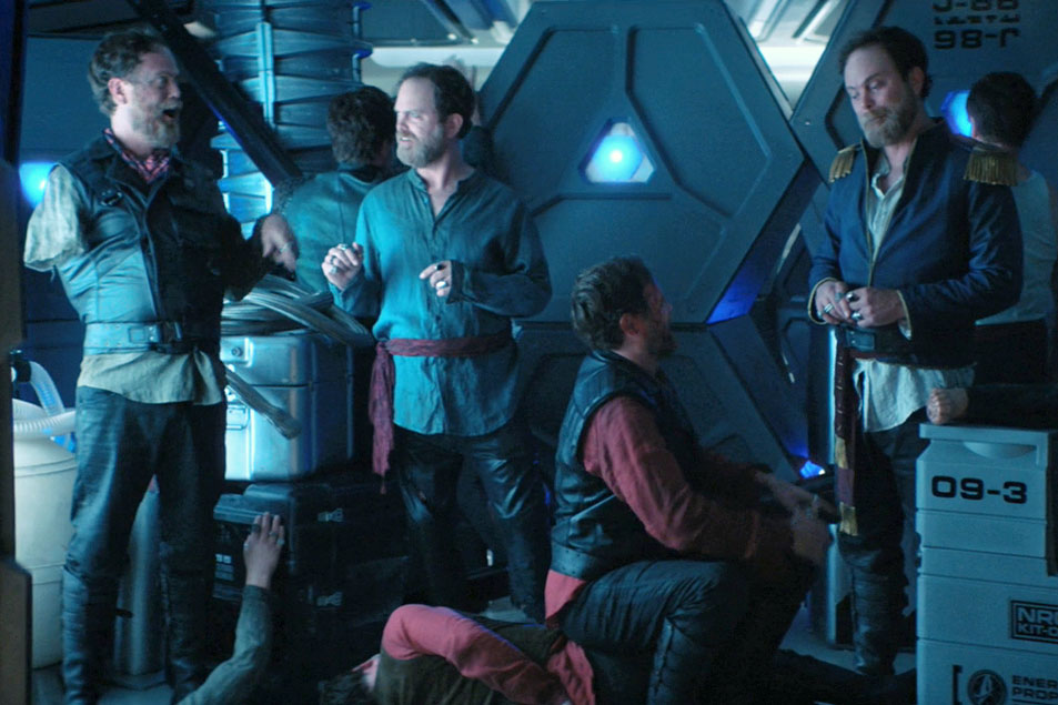 A horrible number of androids resembling Harry Mudd (Rainn Wilson) being kept in a ship's cargo hold, from the Short Treks episode "The Escape Artist)